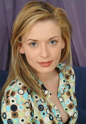 3 white chicks take turns exposing their breasts on top of a sofa